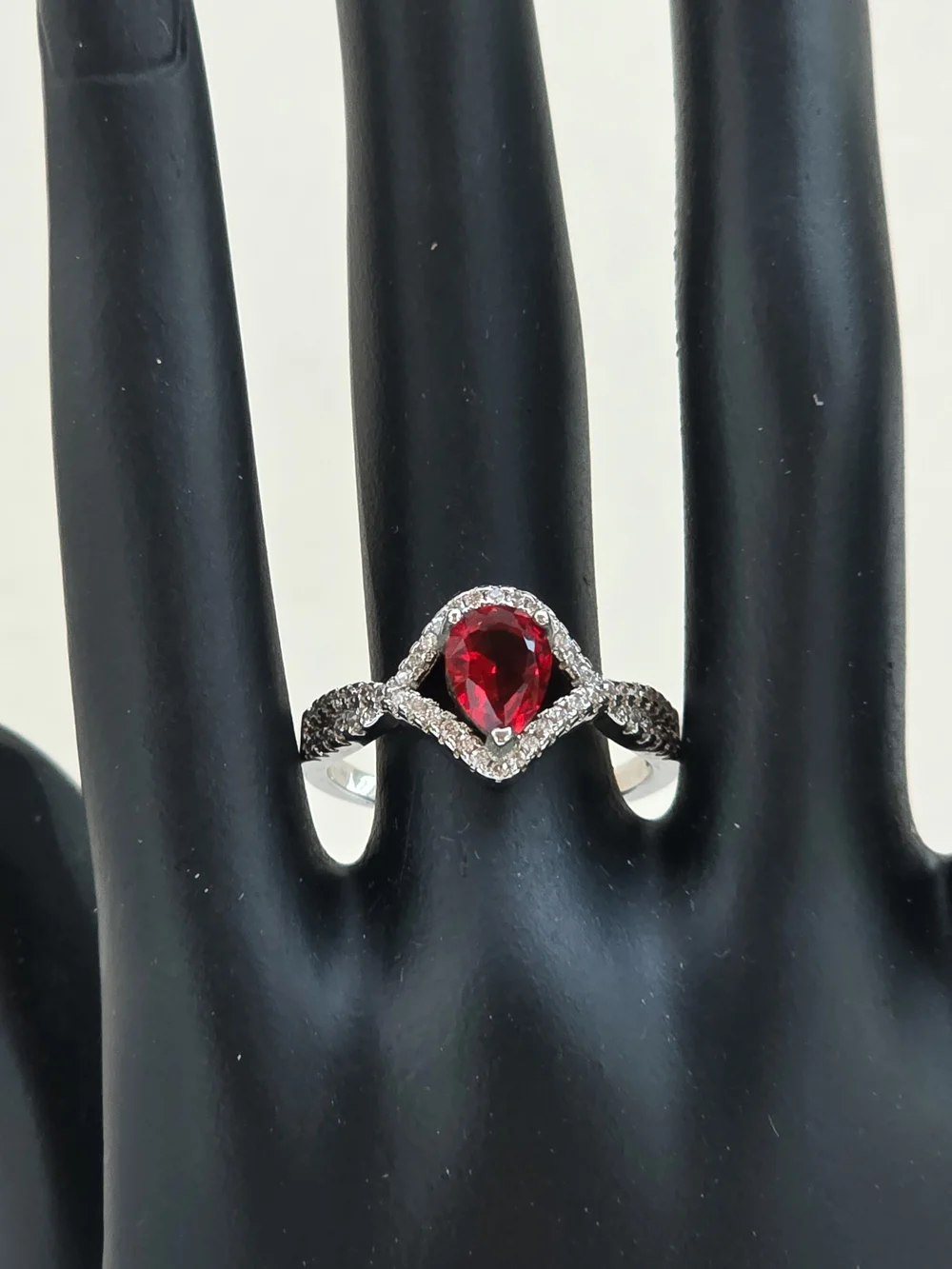 Sterling-Inspired Silver Ring with Pear-Shaped Red Gem and Pavé Halo